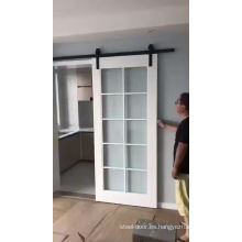 Diseño de la puerta de granero de madera deslizante interior de medio vidrio